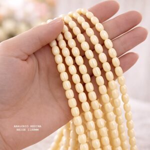 PERLE OVALE EN RÉSINE BEIGE 11×8 MM
