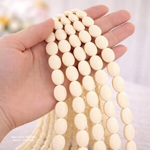 PERLE OVALE EN RÉSINE BEIGE 25×20 MM